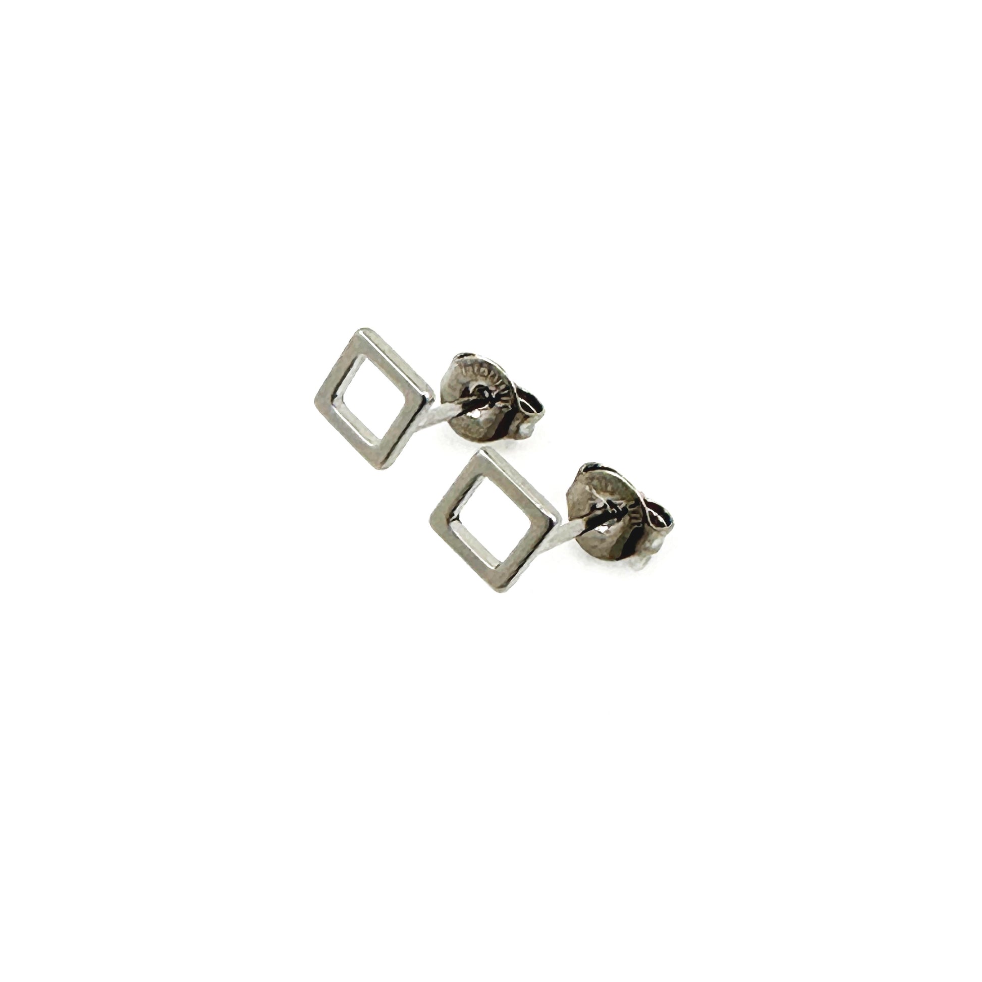 Square Hollow ear studs -solid titanium studs and backs- Feature a small and minimal design on a white background