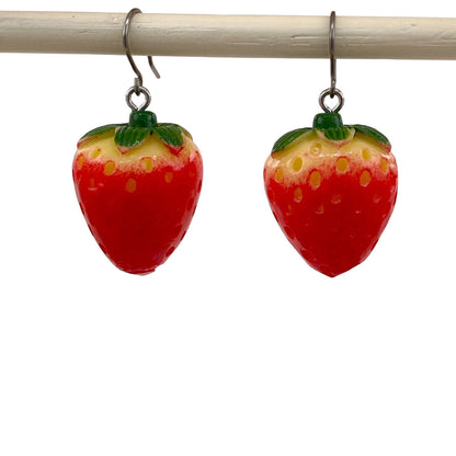 Strawberry earrings with a titanium hook on a white background