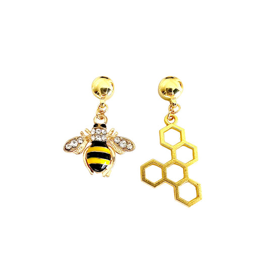 TI-GO Bee and honeycomb earrings. Magnetic titanium interchangeable earring system. Detachable earrings for a truly hypoallergenic jewellery on a white background