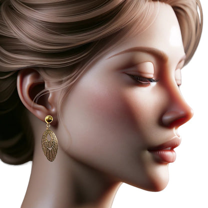 TI-GO Gold Pendant Earrings. Detachable earrings for a truly hypoallergenic jewellery on a white young woman.