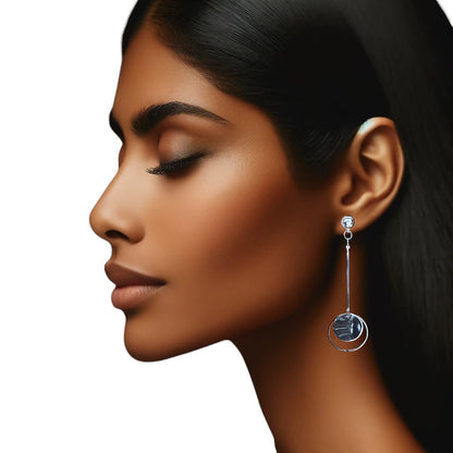 TI-GO Pendulum Earring. Detachable earrings for a truly hypoallergenic jewellery on a young woman.