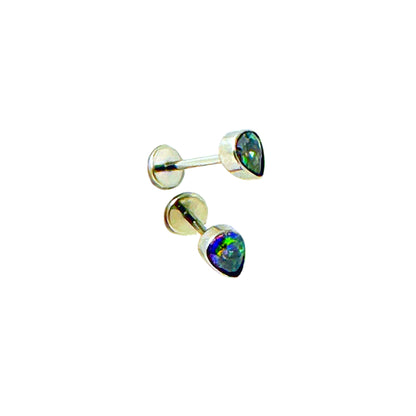 Pair of titanium flat back push in studs with rainbow-colored gemstones on a white background