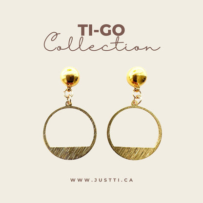 Ti-Go Golden rings earring. Detachable earrings for a truly hypoallergenic jewellery on a white background collection