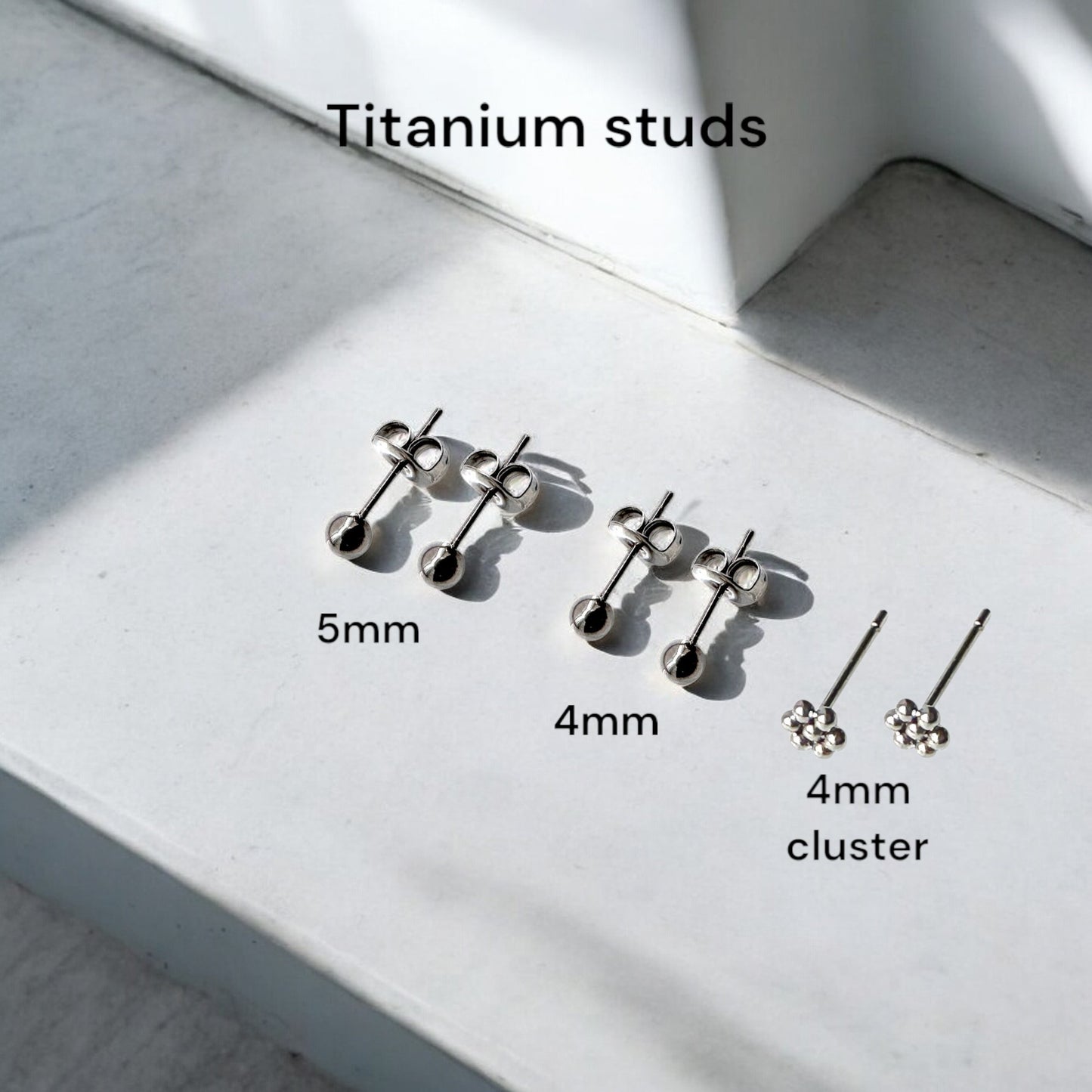 Titanium Ball Studs solid titanium studs and backs Feature a small and minimal design on a stone