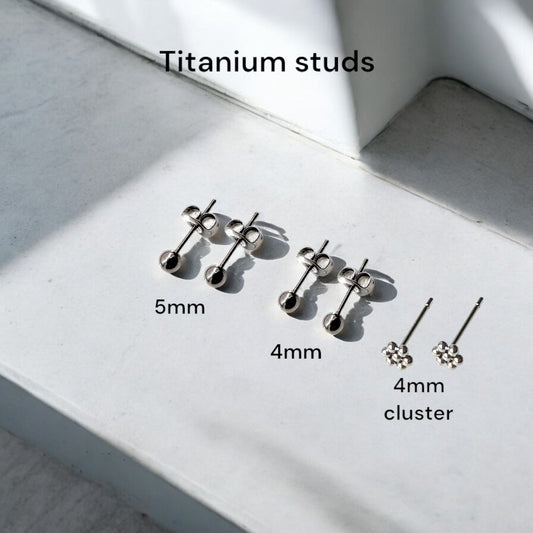 Titanium Ball Studs solid titanium studs and backs Feature a small and minimal design on a stone