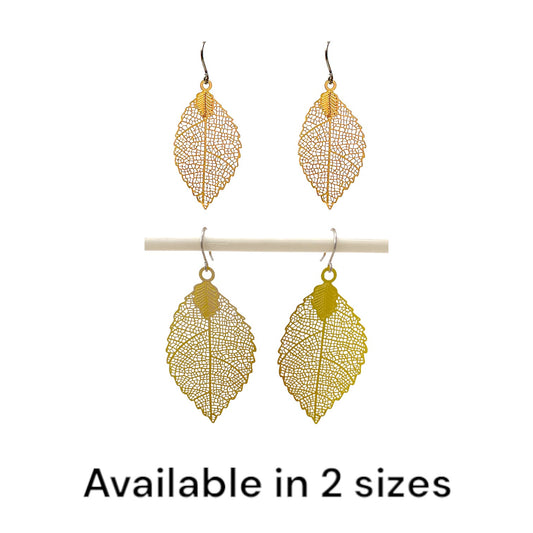 Gold disc leaf earring and a titanium hook on a white background