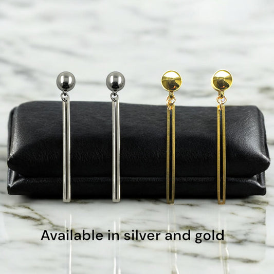 Silver and Gold narrow rectangular loop earring. Detachable earrings for a truly hypoallergenic jewellery on a white black background