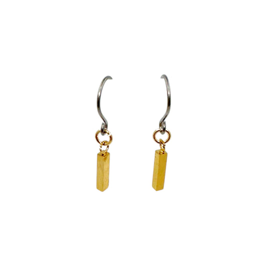 just titanium a play on the periodic table for titanium, but it also stands for these beautiful mini mirrored gold bar earrings.