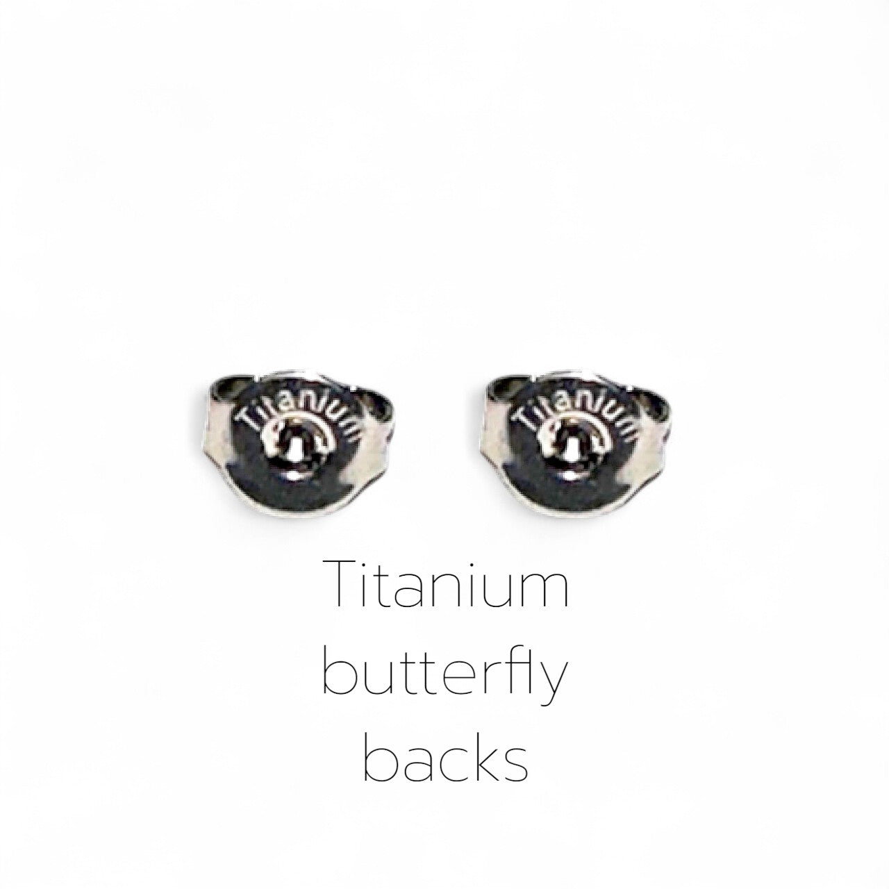 Two titanium butterfly earring backs on a white background with 'Titanium' text.