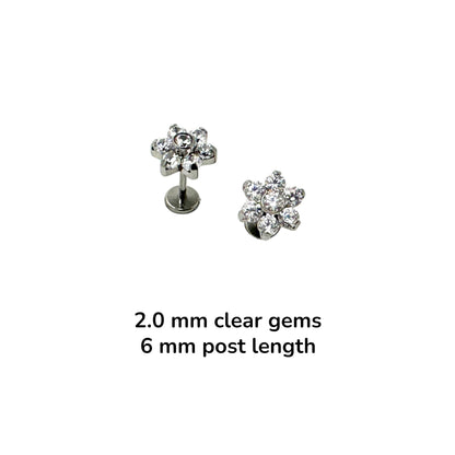 Pair of titanium earrings with clear 2.0 mm gemstones on a white background 6mm post