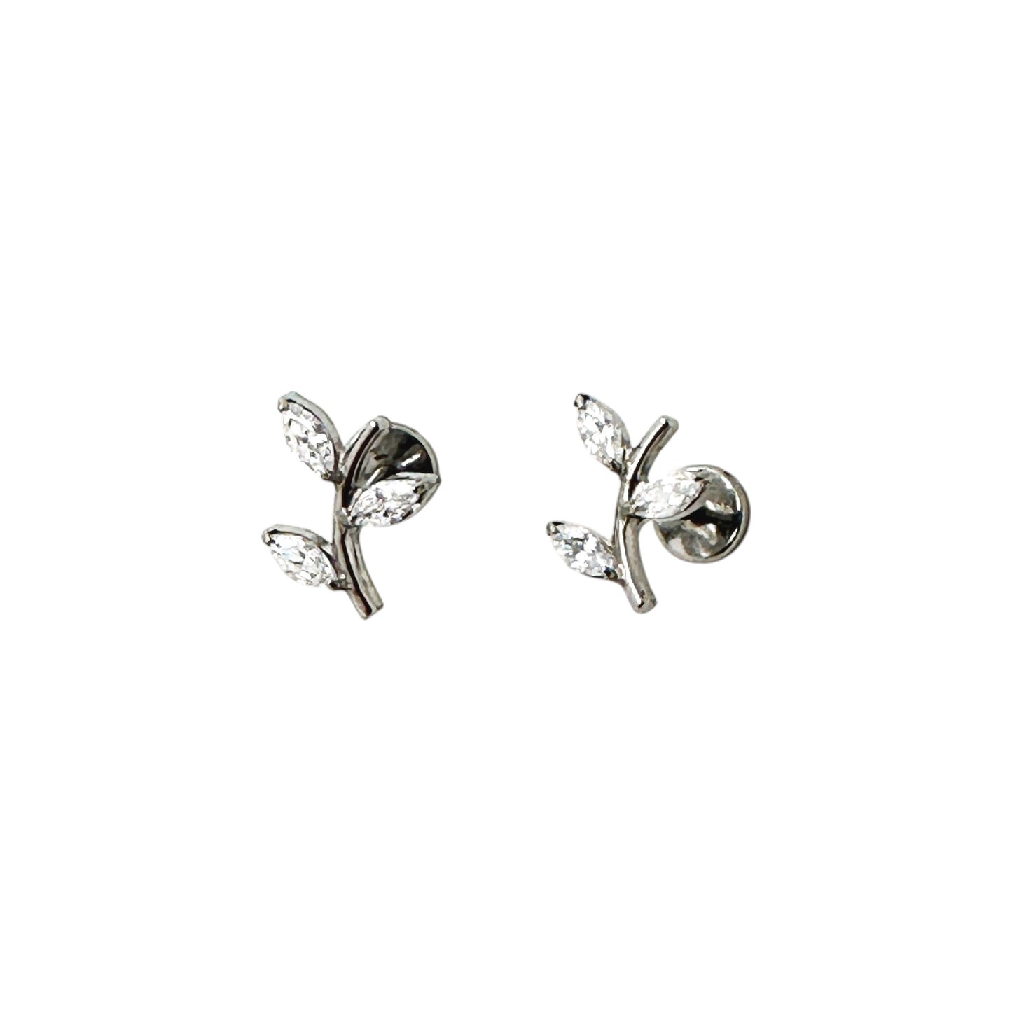 Pair of titanium flat-back threadless branch-shaped earrings on a white background