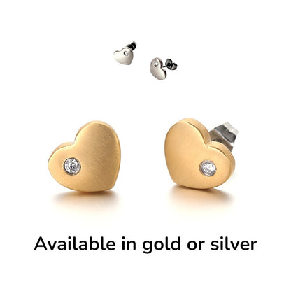 Gold or silver titanium Diamond Heart Studs. These studs shown on a white background with avilability text