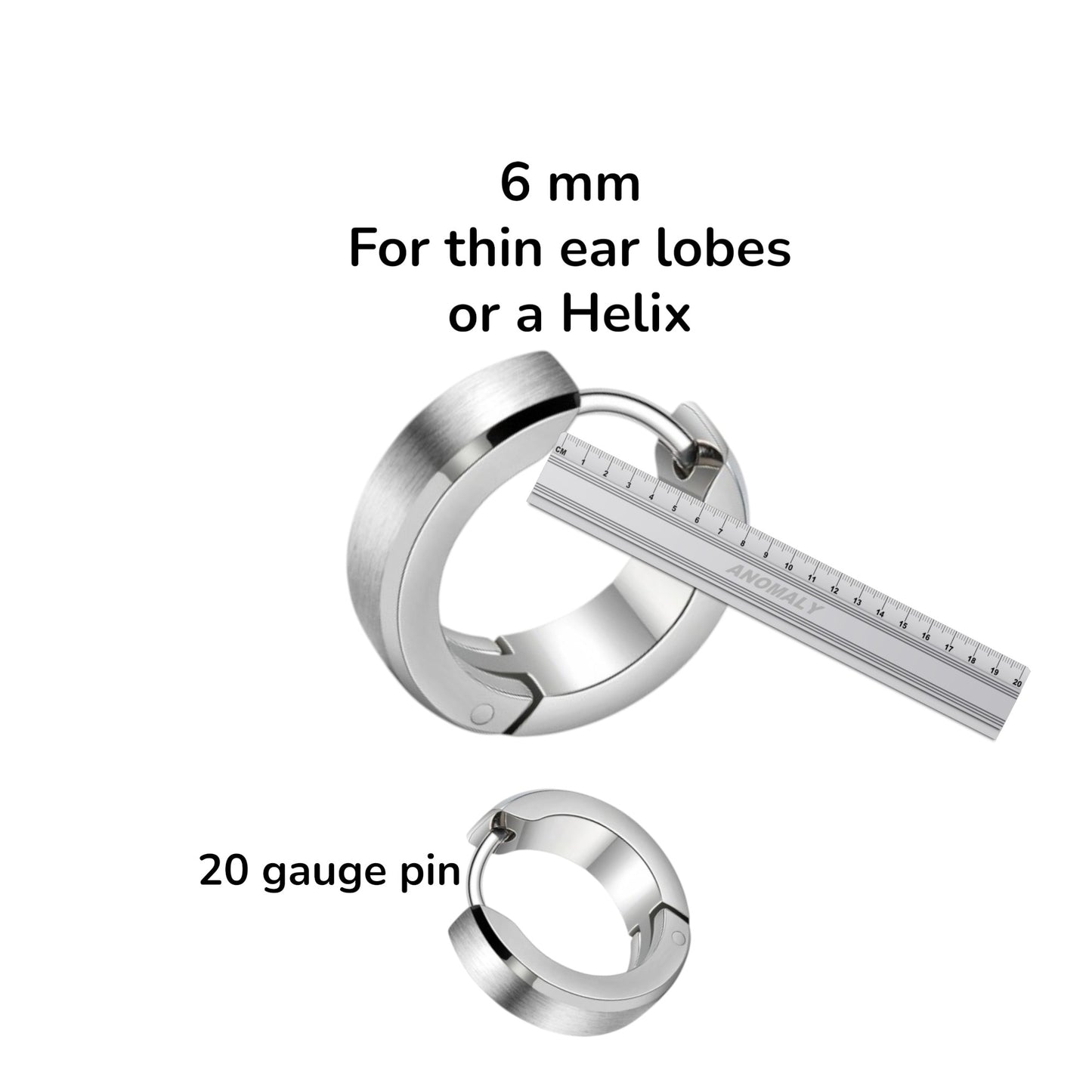 Titanium hoop earrings with a ruler for size reference on a white background