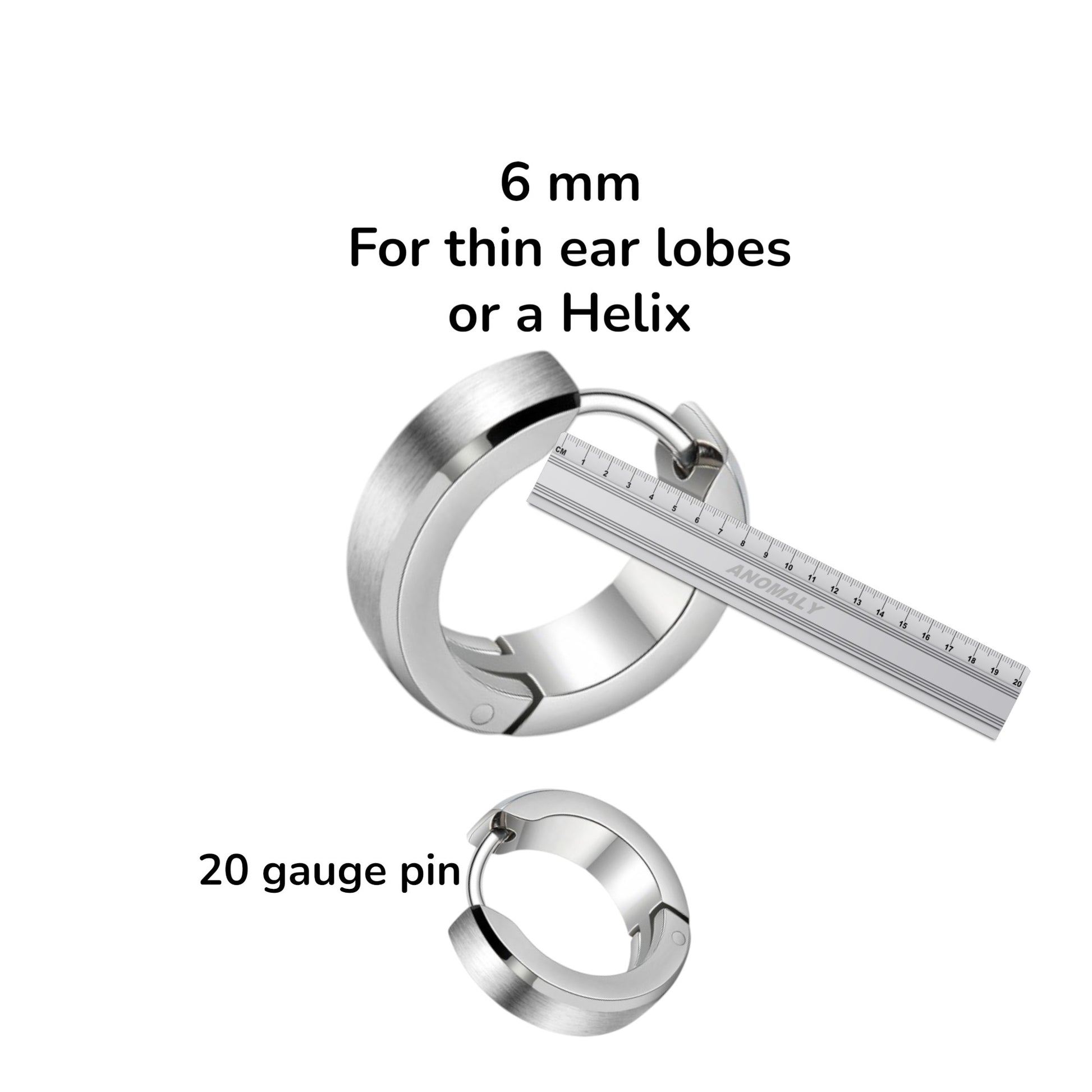 Titanium hoop earrings with a ruler for size reference on a white background