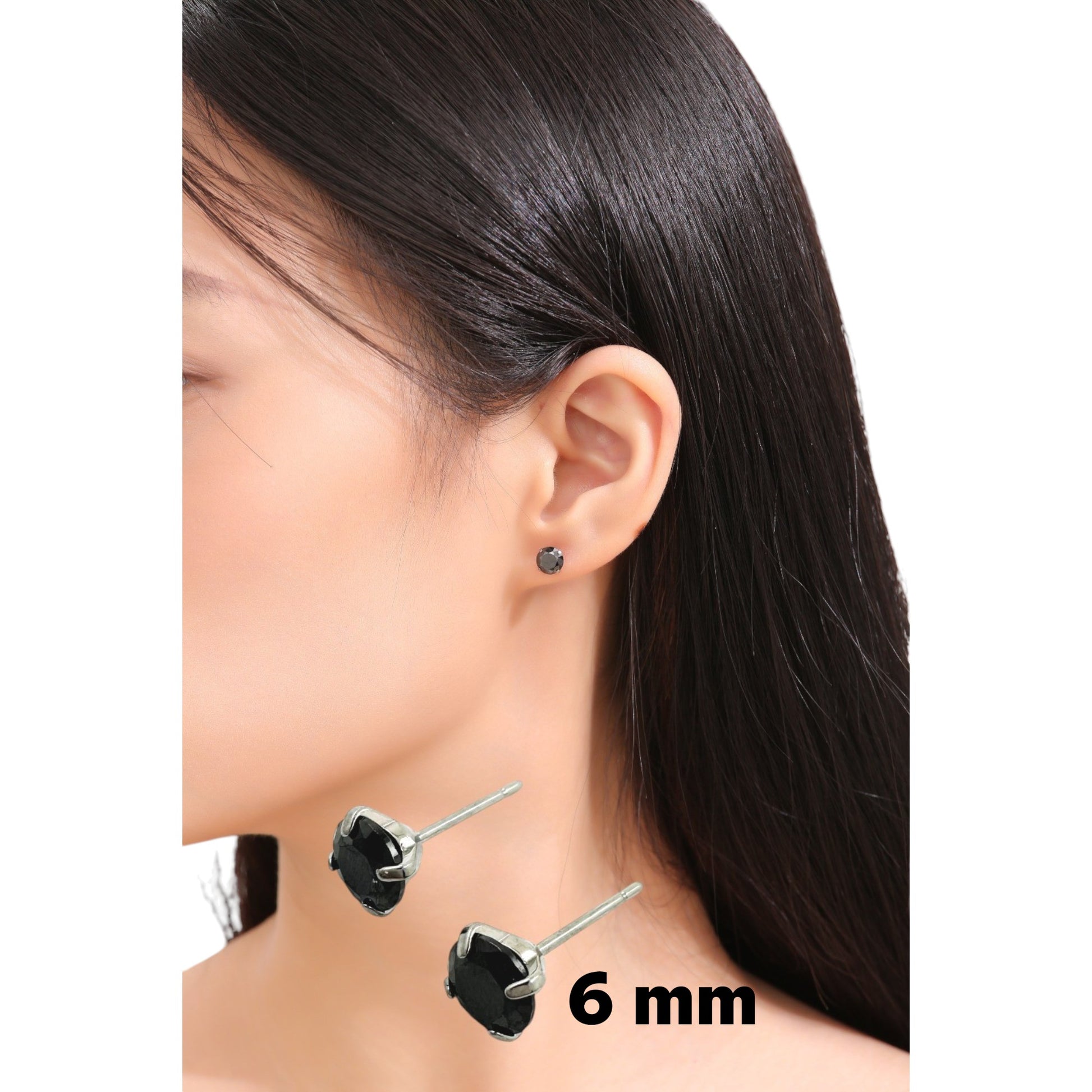 Black Gem Studs titanium large 6 mm on a white woman