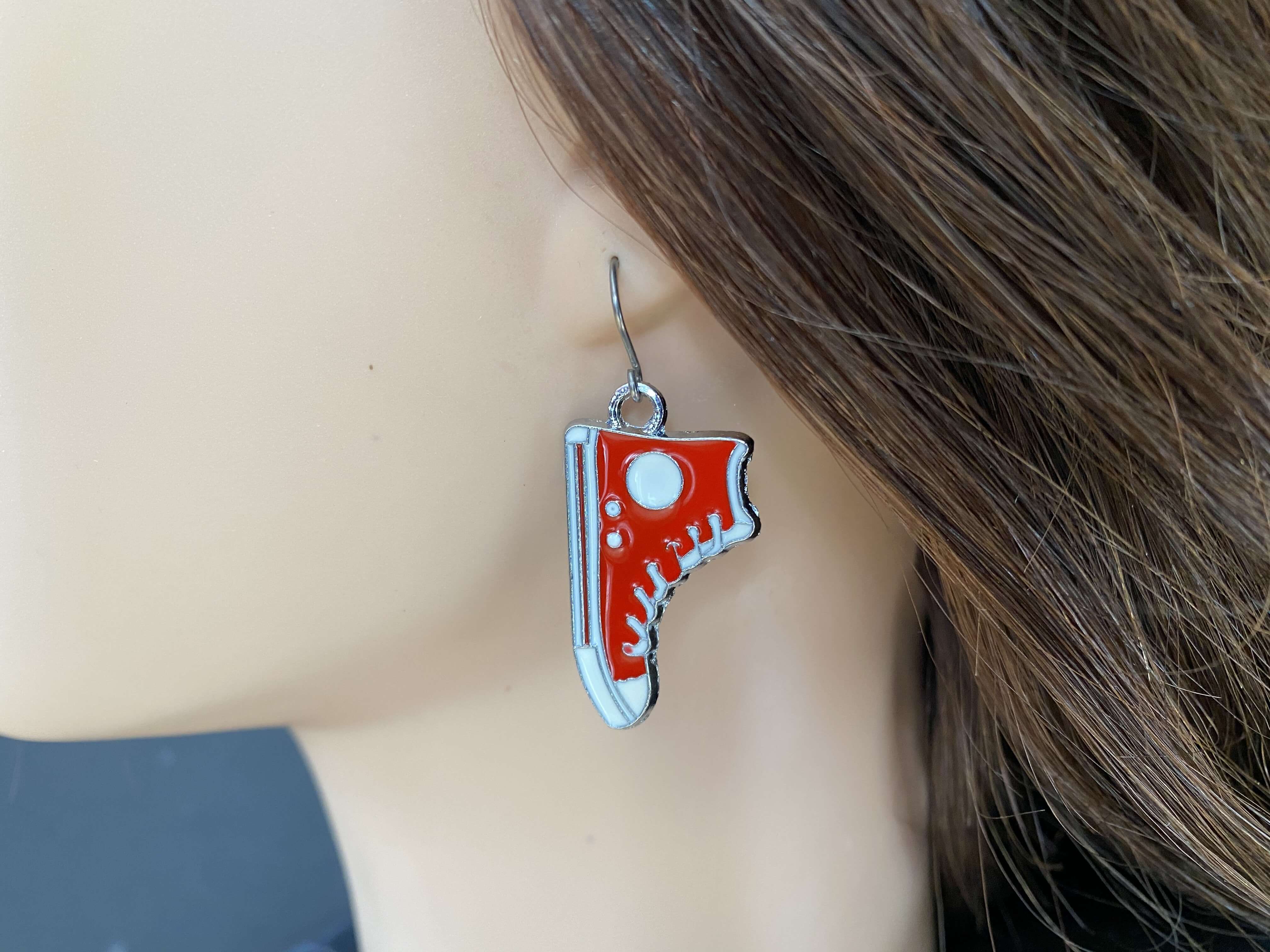 Converse Charm red on ear