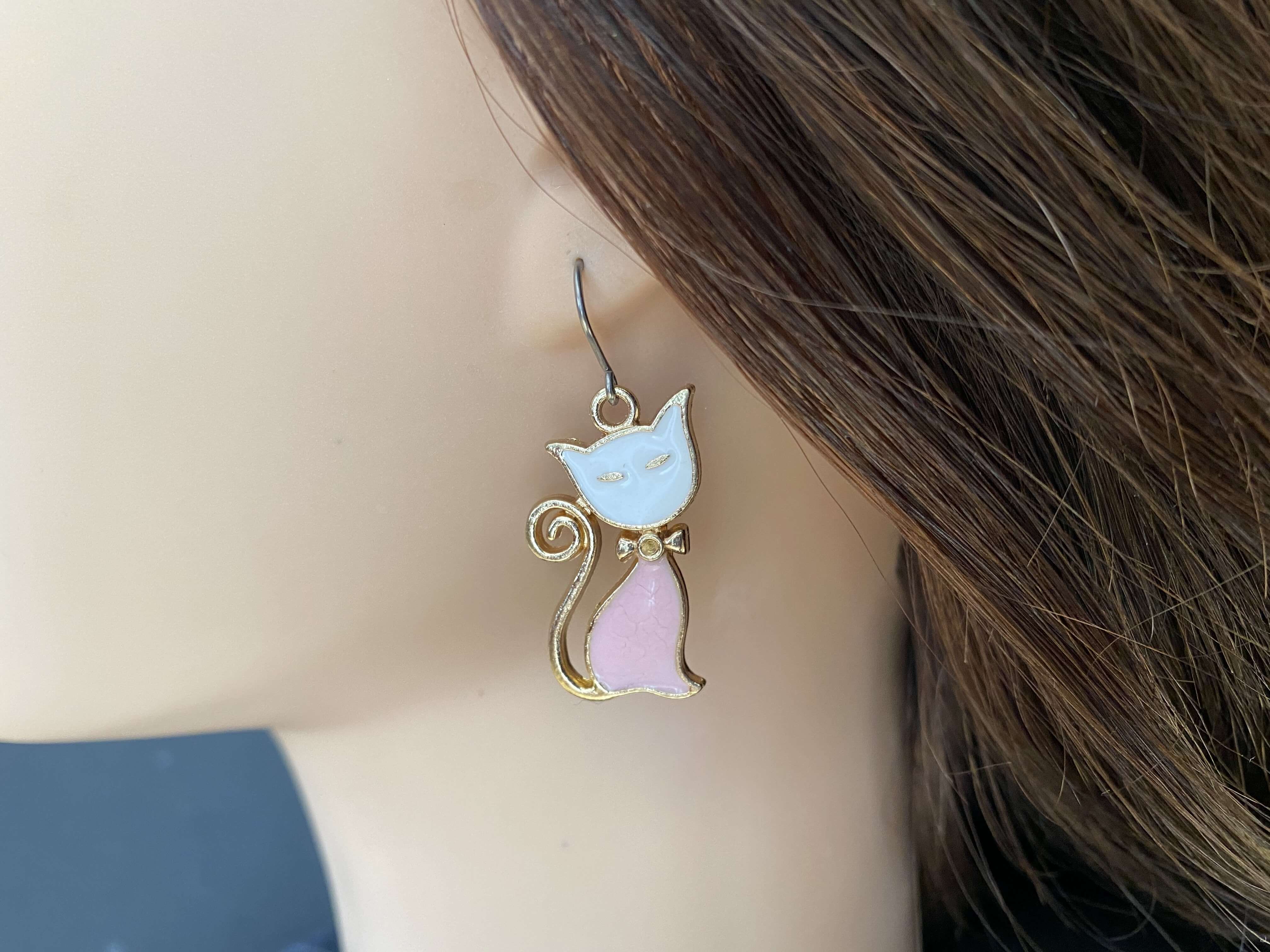 Cat Charm pink on ear