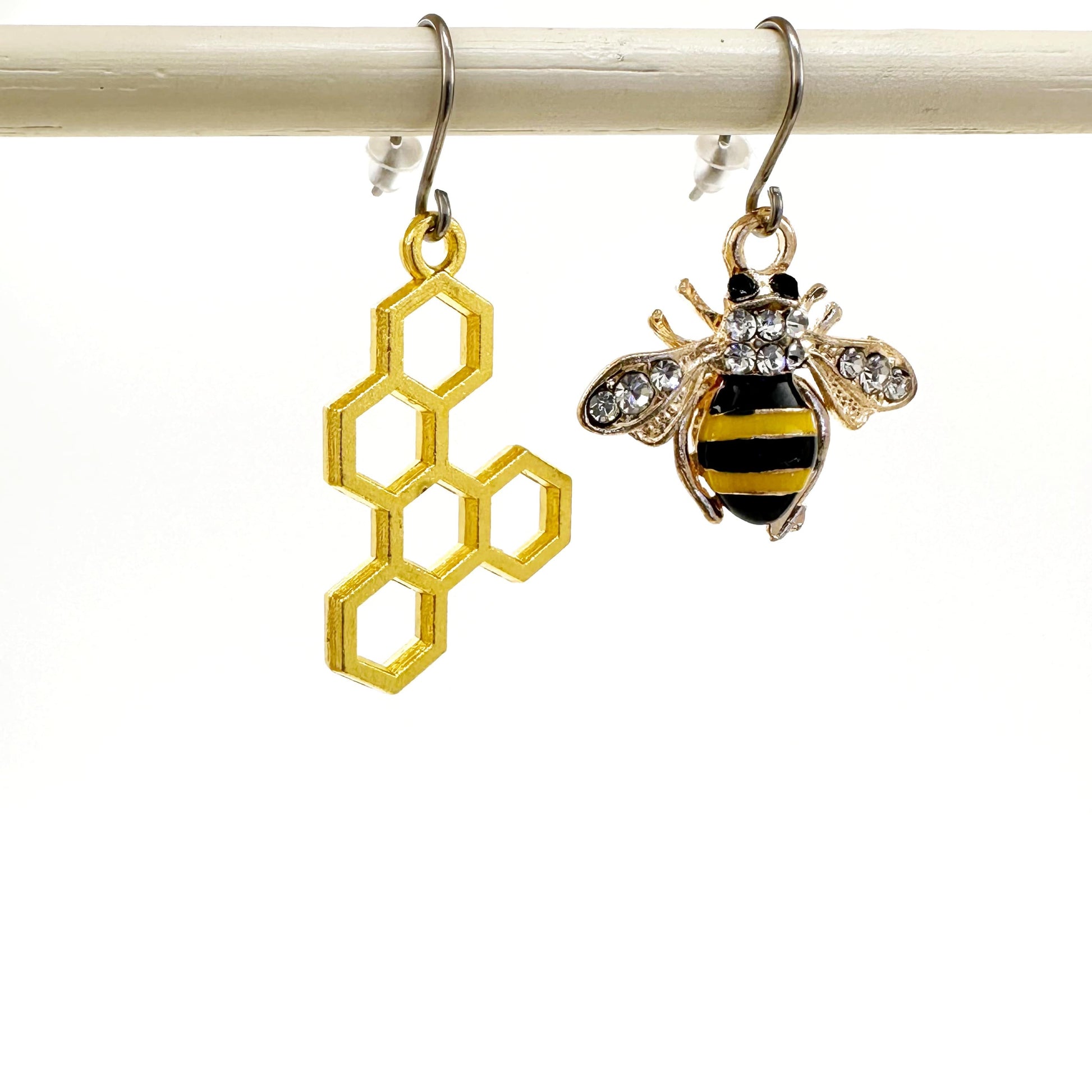 Bee and honeycomb earrings with titanium hook.