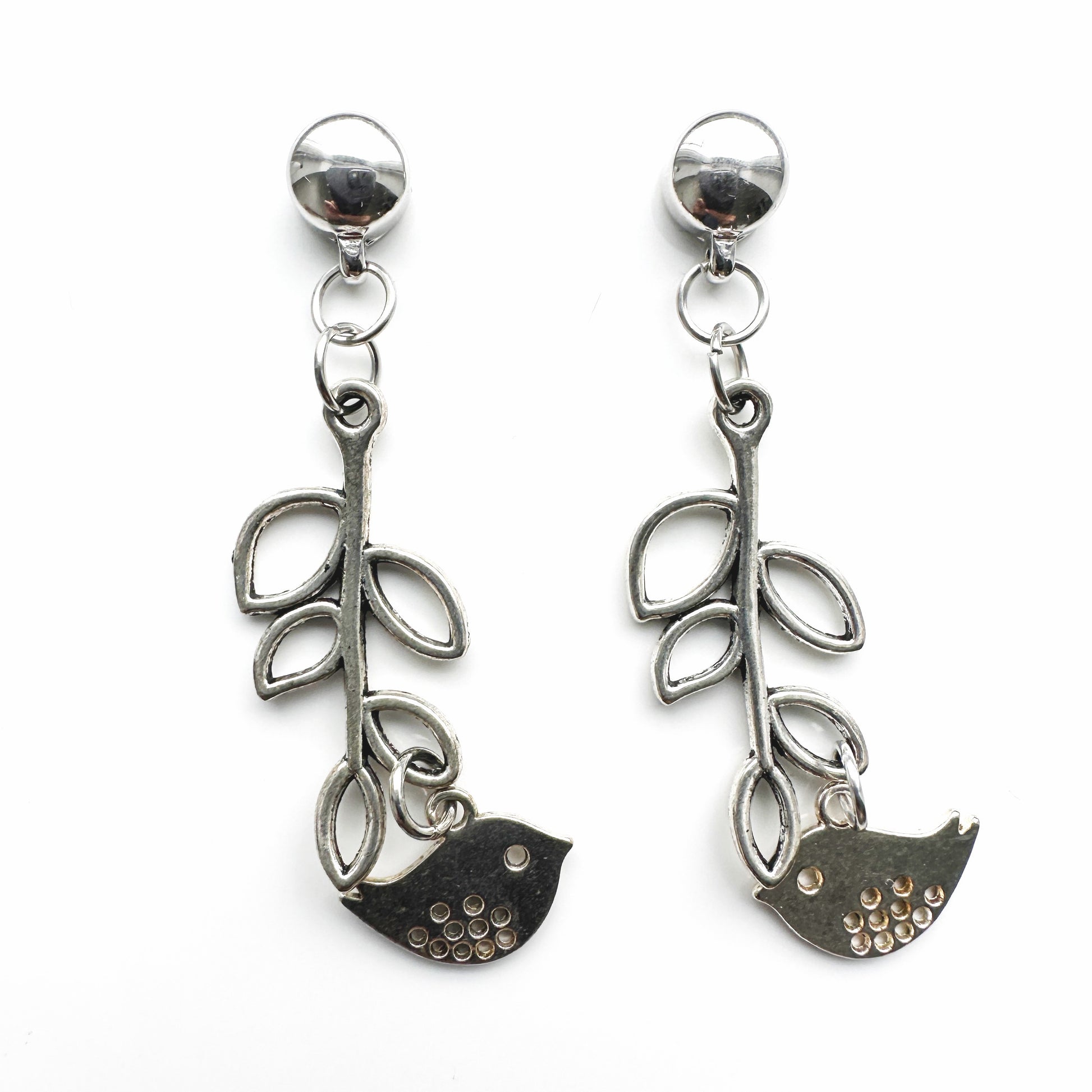 Magnetic Songbird Charm earrings. Detachable earrings for a truly hypoallergenic jewellery on a white background