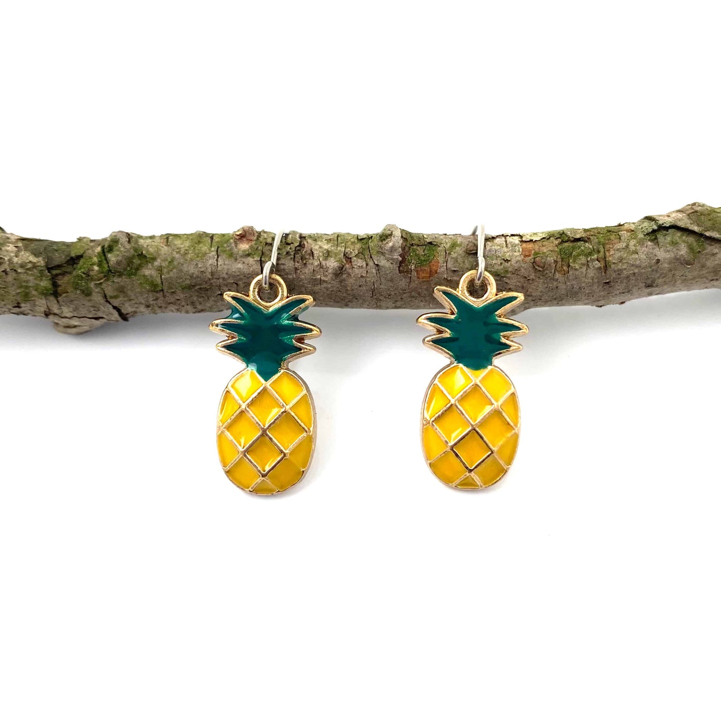 Pineapple Charm earrings with a titanium hook on a white background
