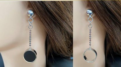 Magnetic Silver chain and ring earring. Detachable earrings for a truly hypoallergenic jewellery on a white young woman.