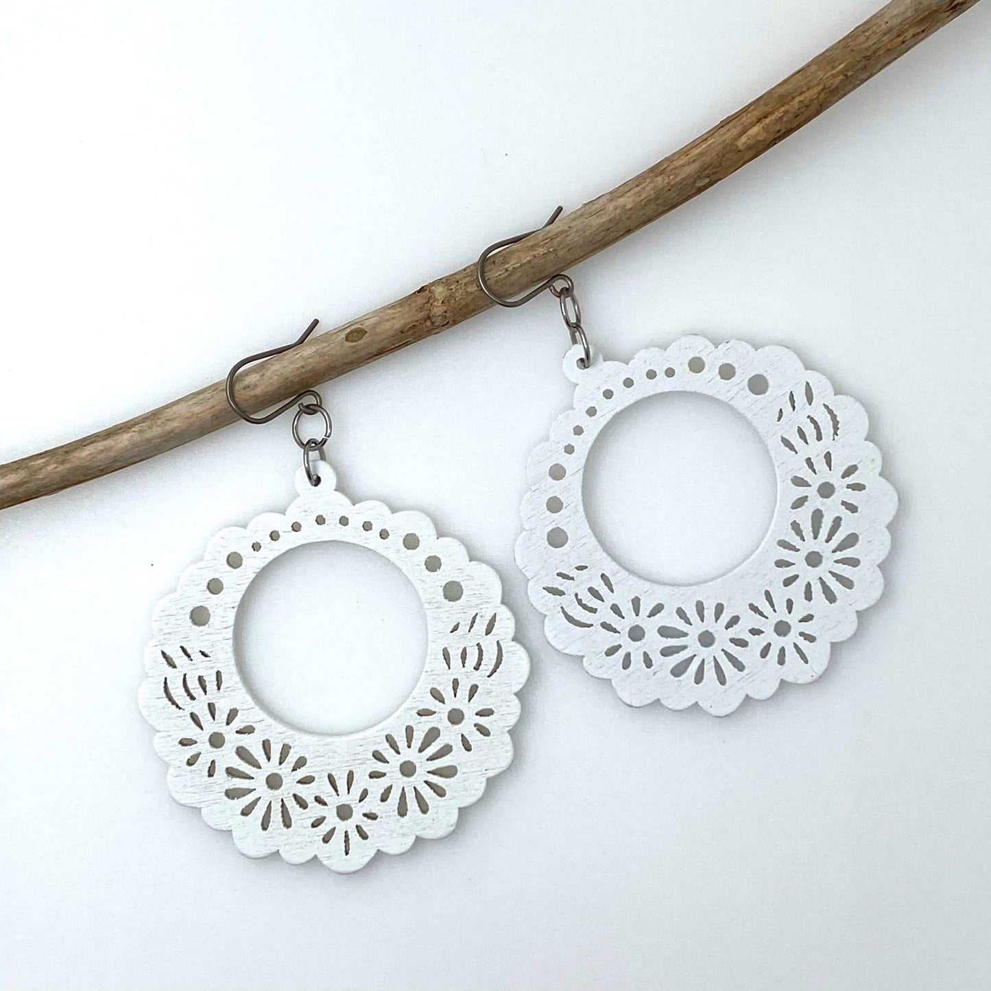 Wooden Floral earrings on a white background.