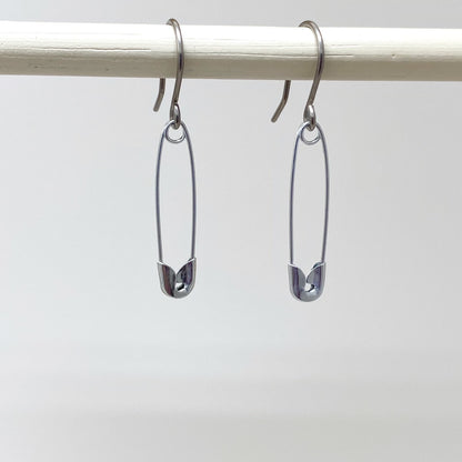 SafetyPin earrings with a titanium hook on a white background